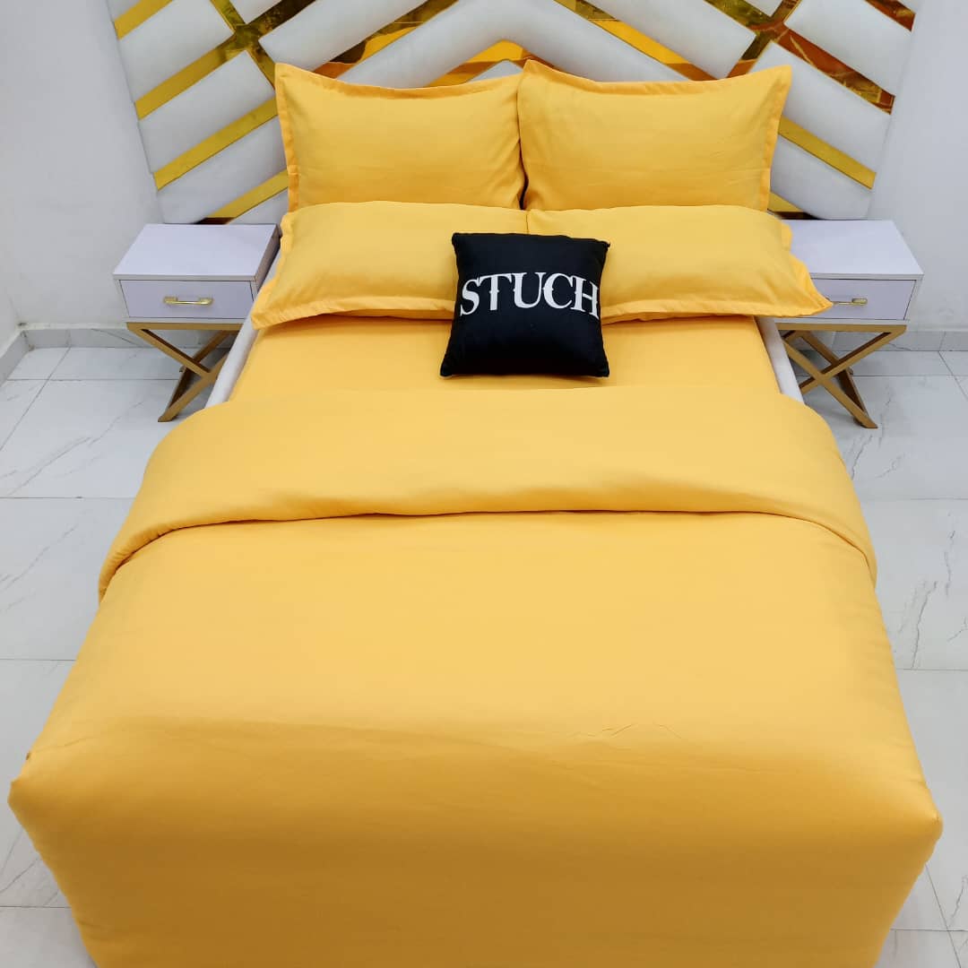 PLAIN YELLOW 7/7 BEDSHEET WITH FOUR PILLOW CASES AND DUVET COVER